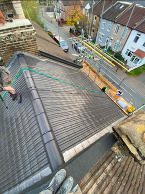New pitched roof installation in Plumstead for property extension with breathable membrane and matching tiles