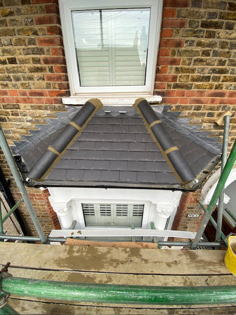 New roof installation in Sidcup featuring premium concrete tiles, new battens and felt with complete ventilation system